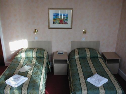 Grand Ash Hotel Ландъндо Стая снимка