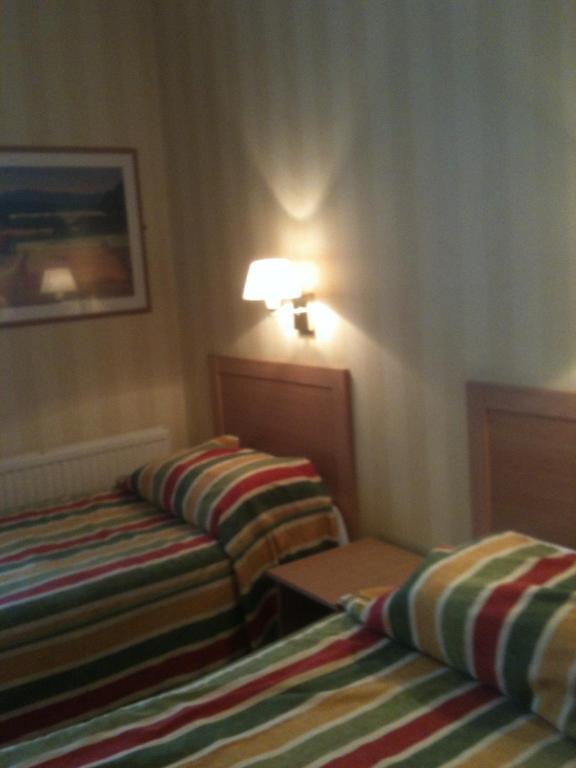 Grand Ash Hotel Ландъндо Стая снимка